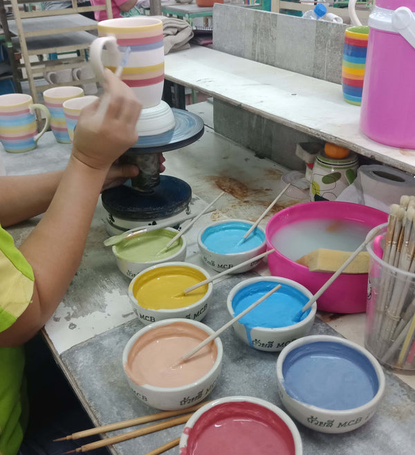 Hand painting rainbow ceramics