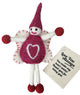 A felted wool fairy doll with a magenta body, white wings, and magenta pom-pom accents, shown with a cream gift tag that reads 'Love You Always. You make my heart smile! Thank you for being you'.