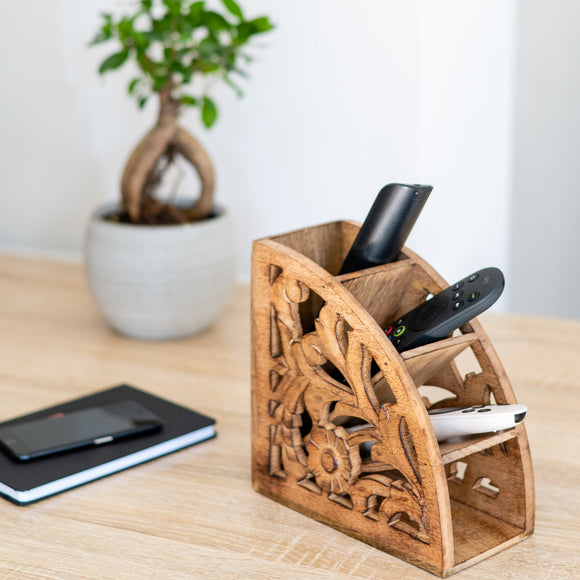 Wooden remote control storage with remotes