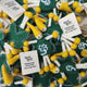A pile of 'Good Luck' fairies with message tags