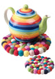 rainbow teapot on mat