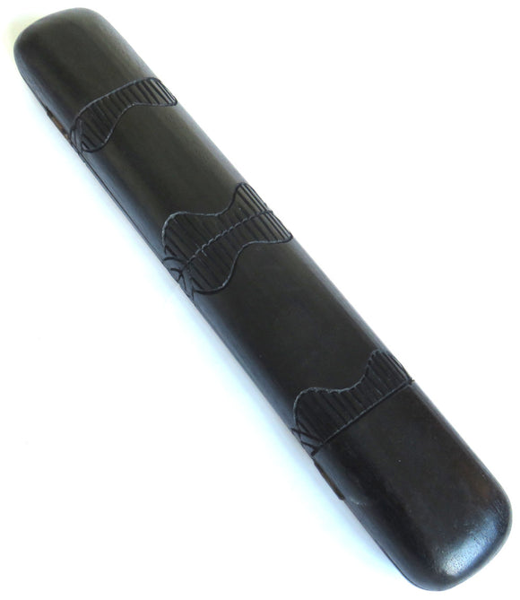 A black oware wooden game shown with the box closed and the outside carved design on the box