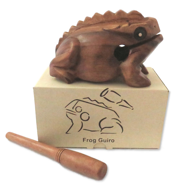 Wooden frog guiro with box on a white background