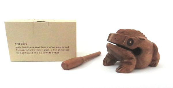 Wooden frog-shaped musical instrument with gift box showing instructions