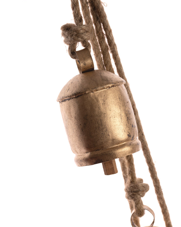 close up of a cow bell on a rope