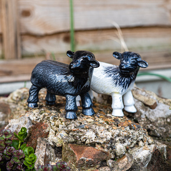 Two sheep together figurines