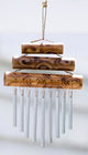 Small triple bamboo musical chime close up