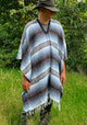 Man wearing mexican poncho